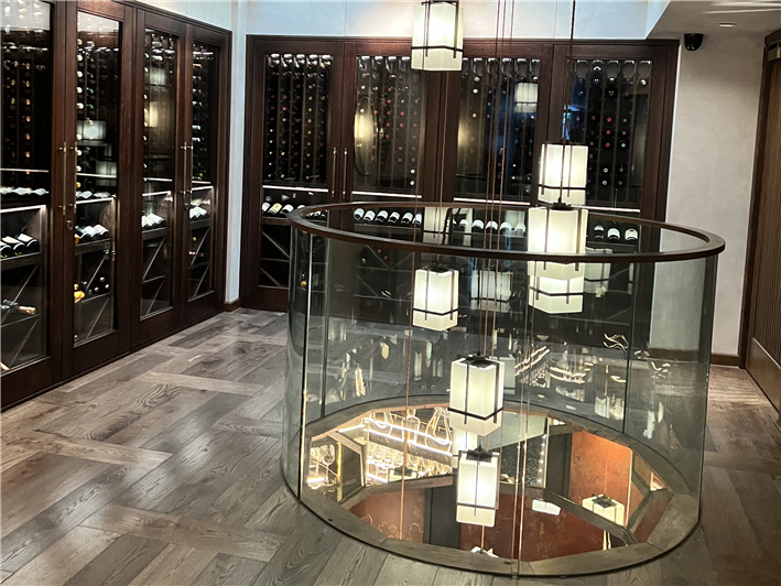 wine cabinet display in entrance